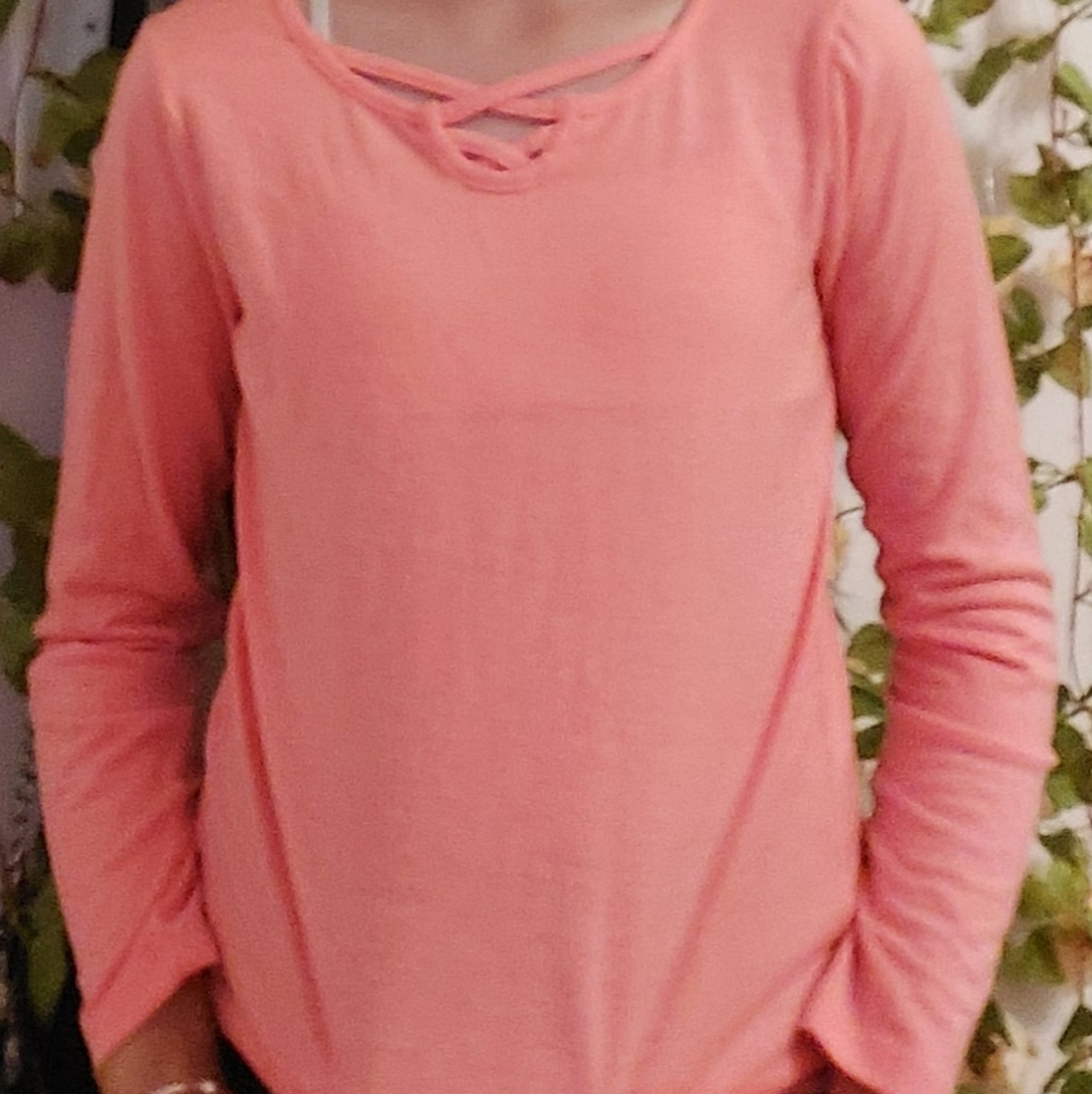 A pink orange long sleeve